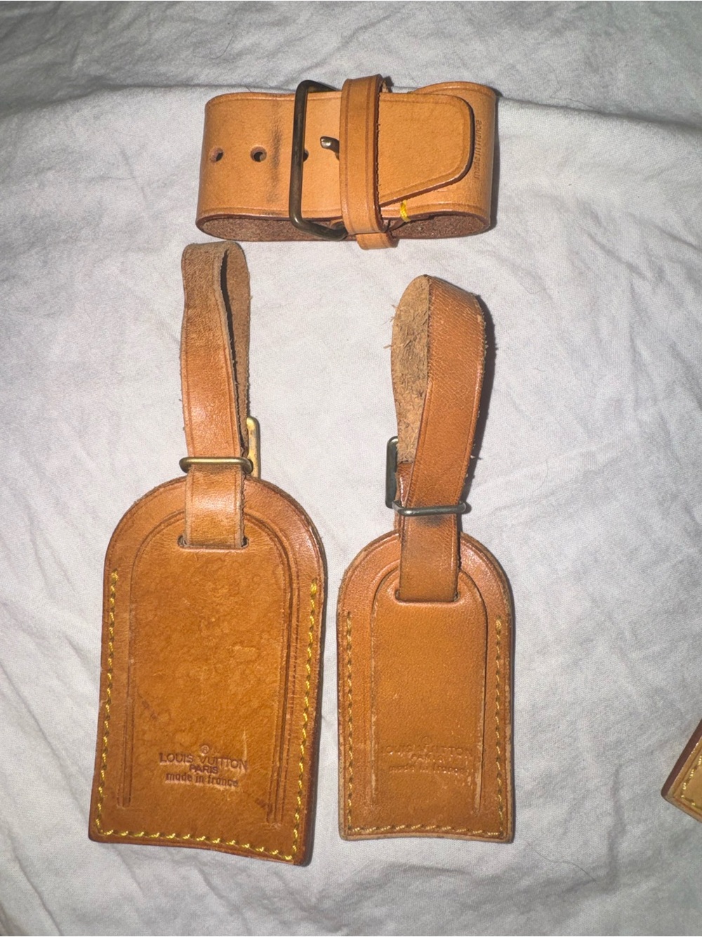 Louis Vuitton Leather Luggage tags (2) and 1 Poignet strap cuff - saddle tan